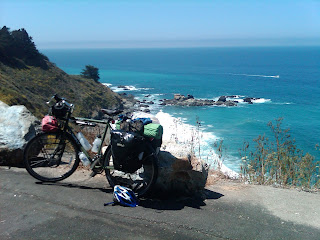 loaded bike on the coast