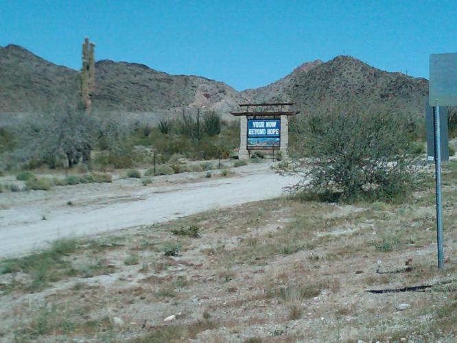 If you look closely, the sign says 'your now beyond hope' Haha, this is the back of their welcome sign.