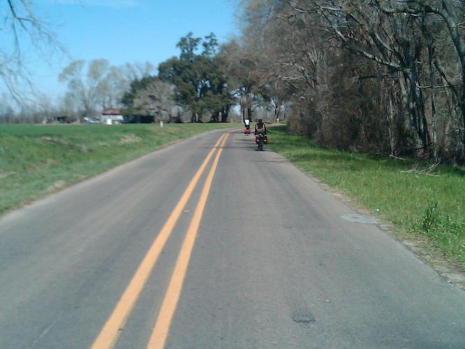 riders in distance