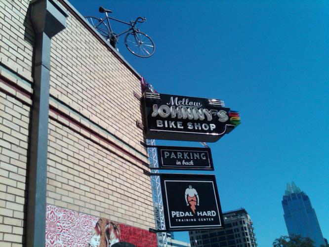 Mellow Johnny's, Lance Armstrong's bike shop in Austin. Got the name because people would pronounce Maillot Jaune, which is french for yellow jersey, wrong and it sounded like mellow john, and when Lance started winning the nicknamed him Mellow Johnny.