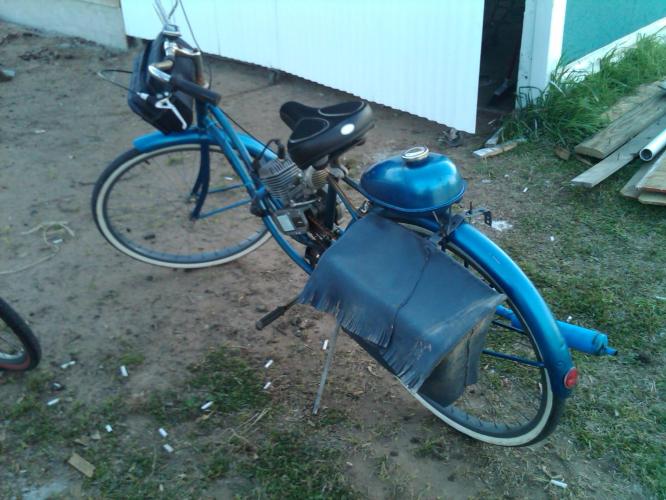 So we saw this guy come rippin down route 6 and cross in front of us on a bike. And as we got closer to him we heard the exhaust. He bought this old schwinn cruiser from goodwill and a motor kit online and built this bike. Its got a 1.8 hp motor and gets like 75 miles per gallon. It was pretty awesome.