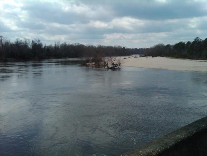 Sabine River. Runs between Texas and Louisiana.